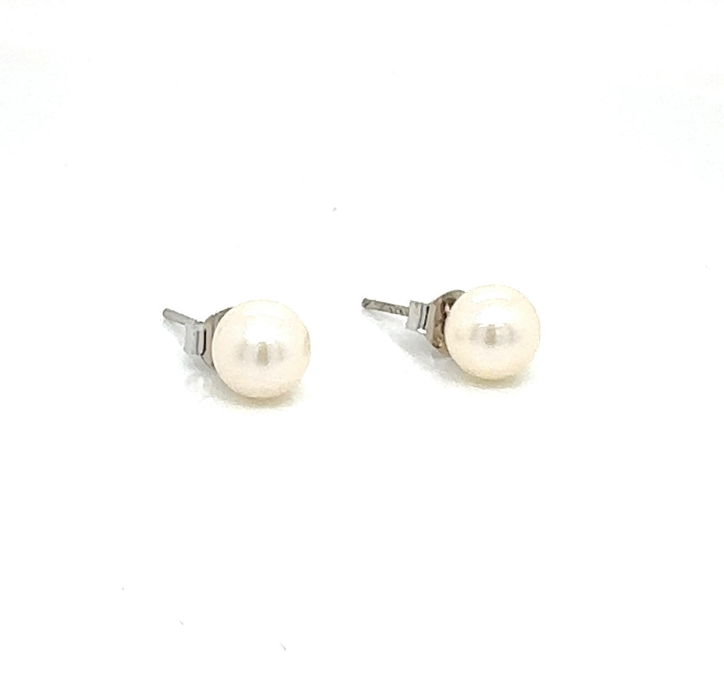 Pearl and silver earring studs