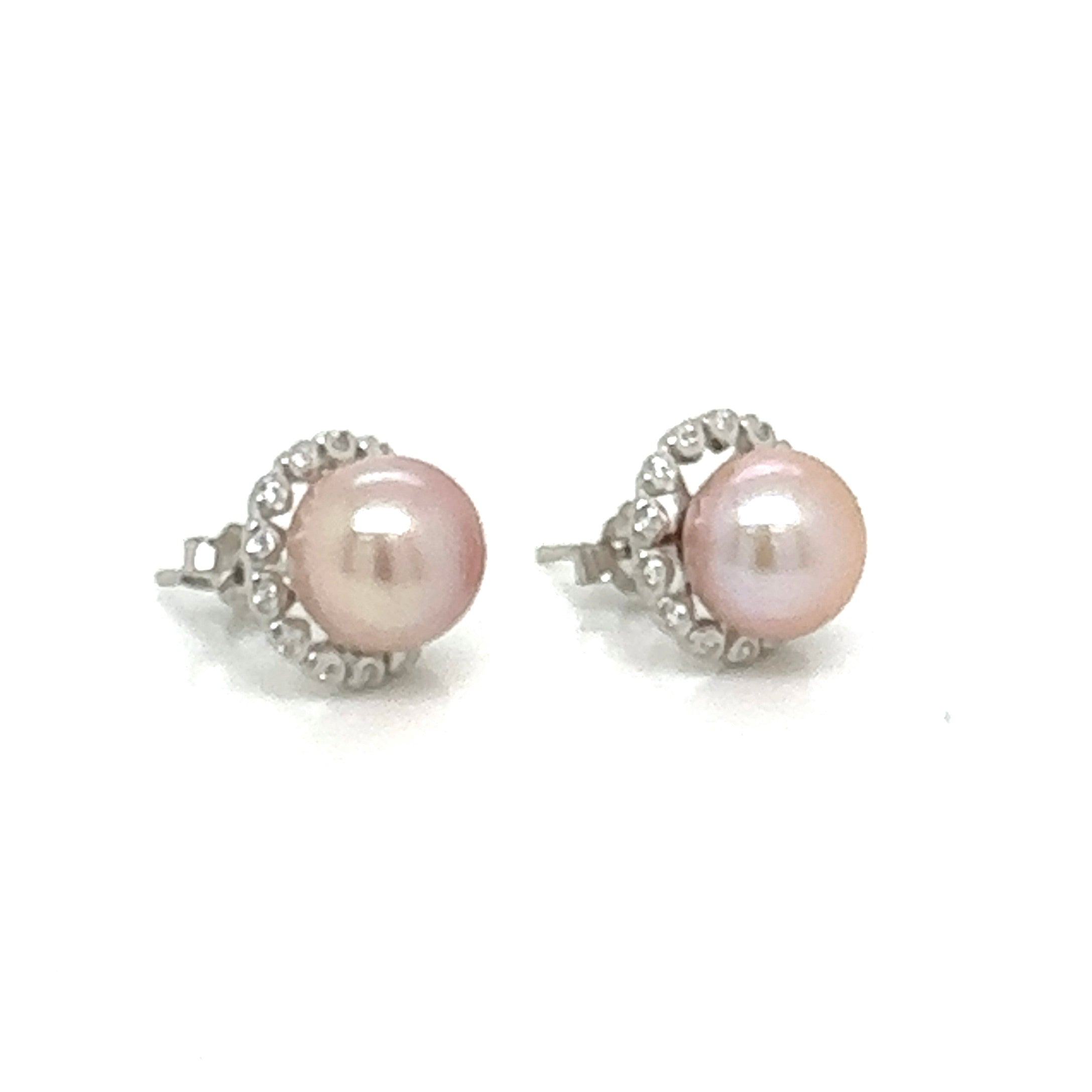 Pink pearl earrings with bling