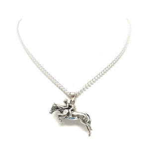 Silver horseback riding pendant