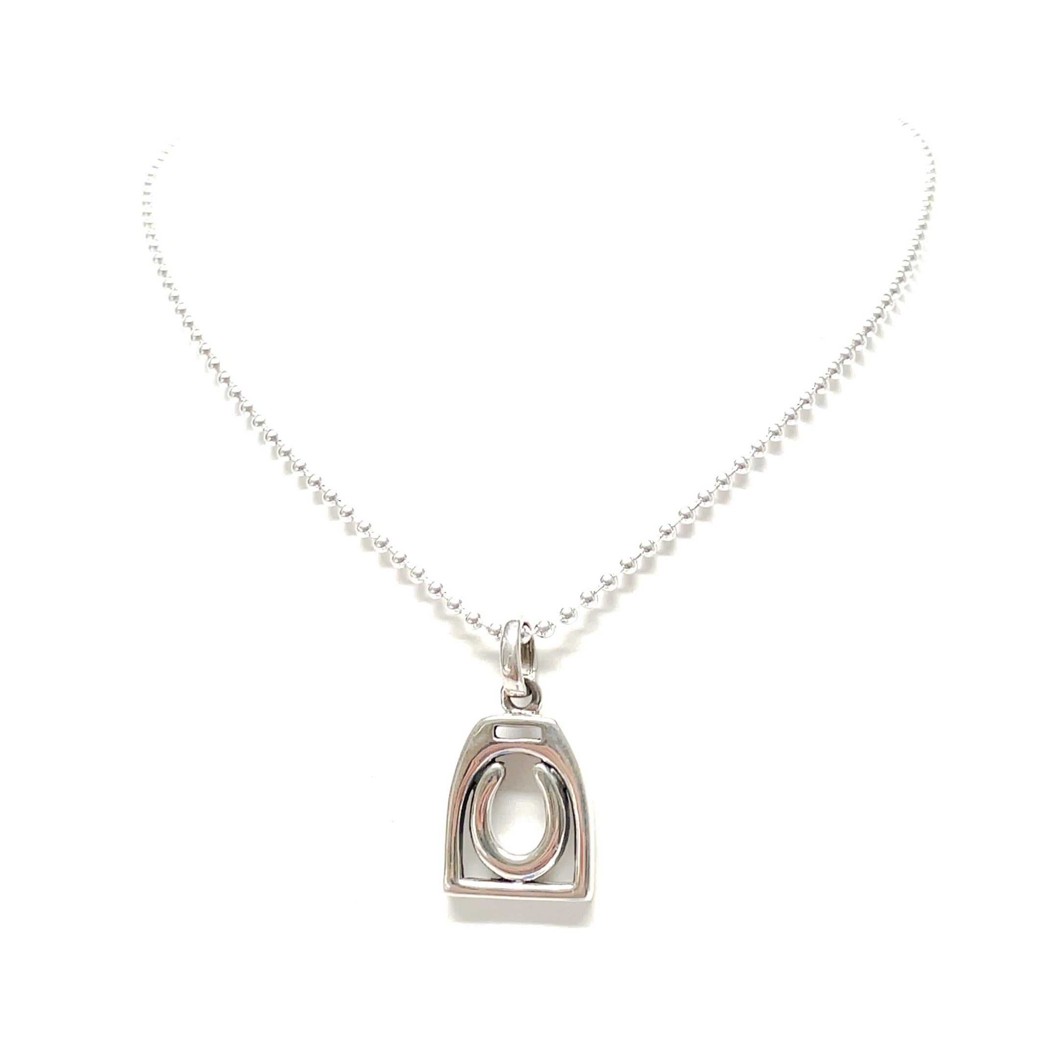 Sterling silver horseshoe and stirrup pendant