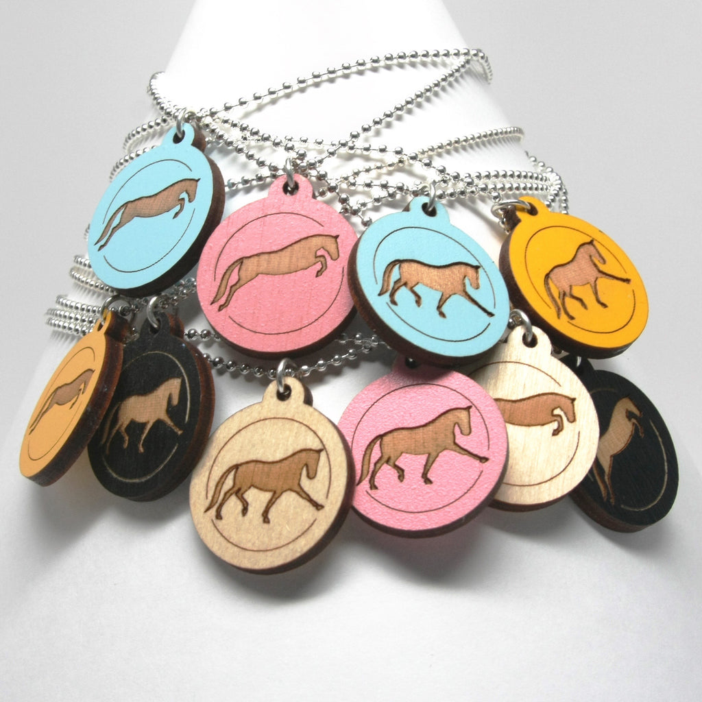 Pendants with a purpose, jumping horse necklace and trotting horse necklace