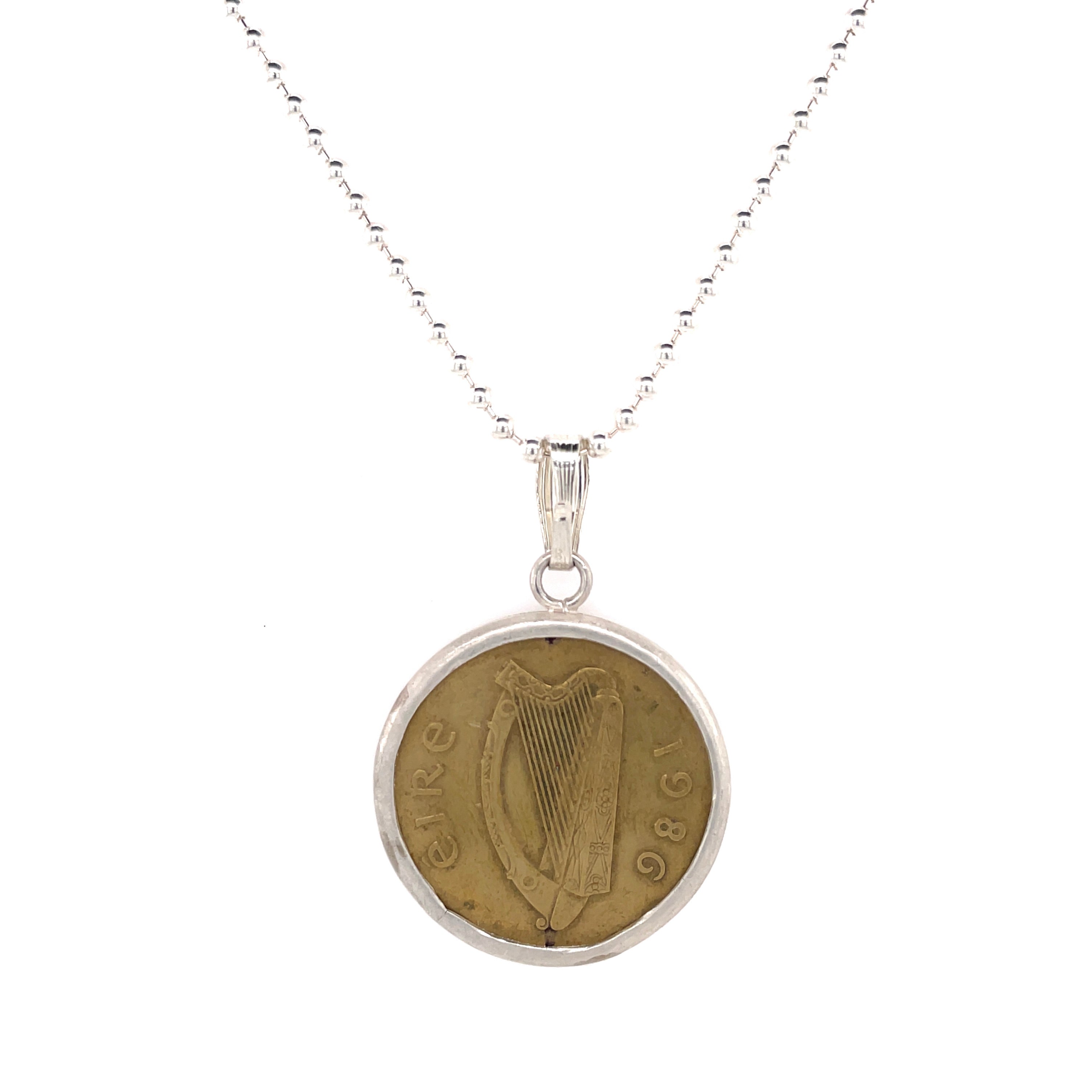 Irish coin necklace with silver setting