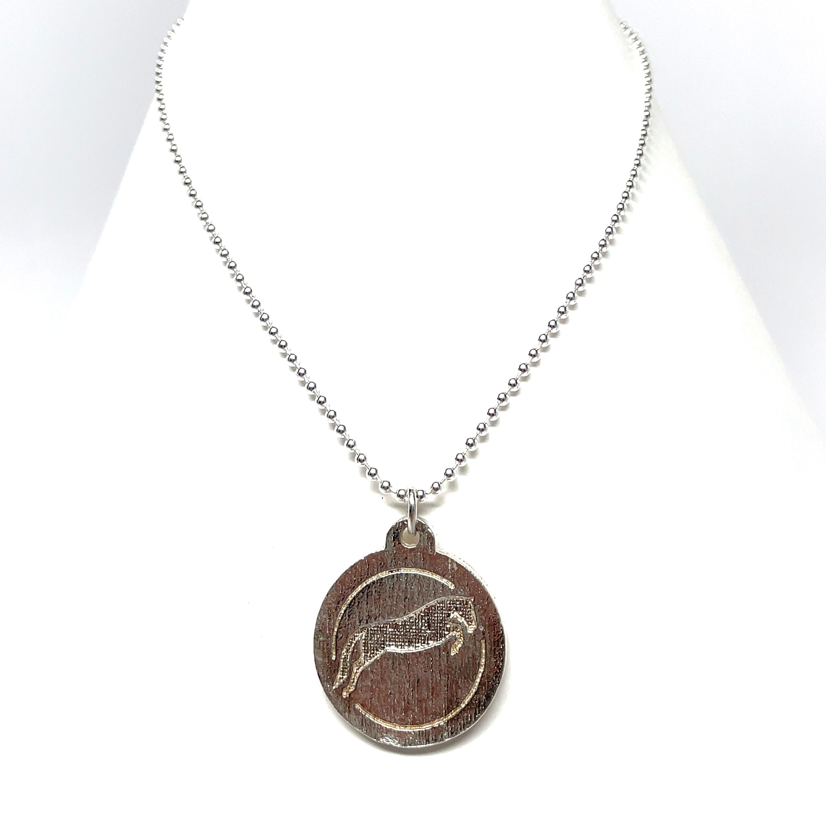 Jumping horse pendant necklace