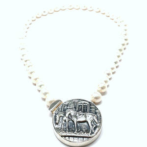 Sterling silver and pearl horse necklace